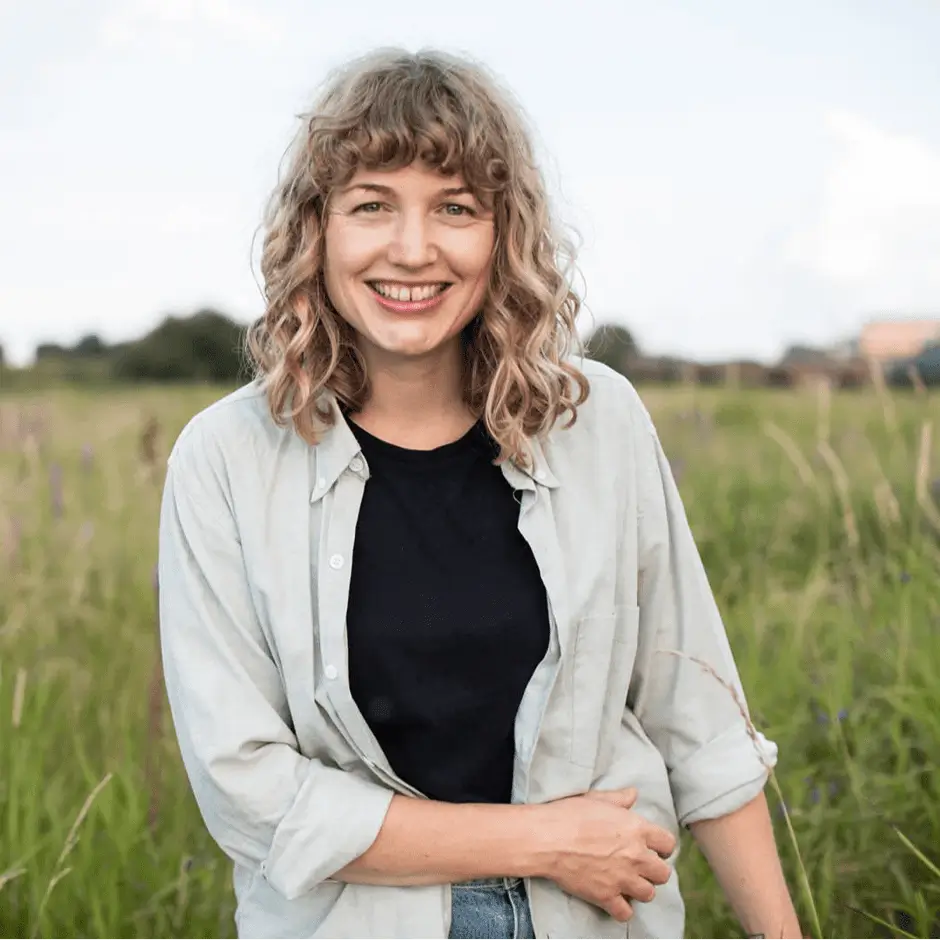 women with waving hair smiling