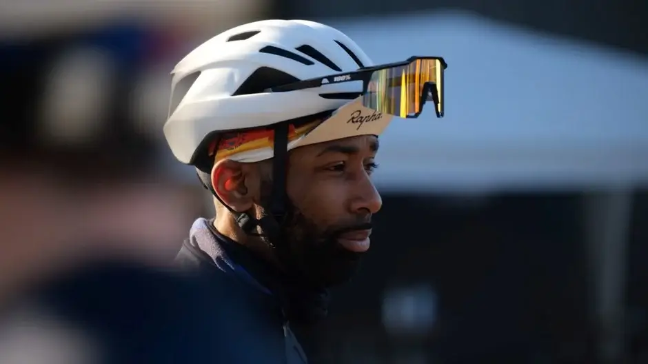 cyclist wearing headgear and sunglasses